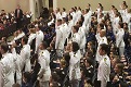 Military medical professionals take their oath at their graduation from the Uniformed Services University of the Health Sciences during a ceremony in Washington, May 18, 2019. More than 200 USU military medical students and graduate nursing students will be graduating early in 2020 to support their colleagues in the U.S. military health system amid the global coronavirus pandemic. (DoD file photo)